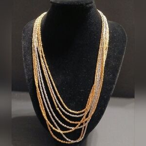 Vintage Trifari gold and silver tone multi strand chain necklace
